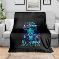Black flame skull graphic blanket with neon 'I'm never alone' and 'My demons…24/7' text