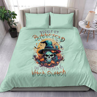 Mint blue bedding set with witch skull graphic and two matching pillowcases