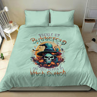Mint blue bedding set with witch skull graphic centered on comforter and two pillowcases