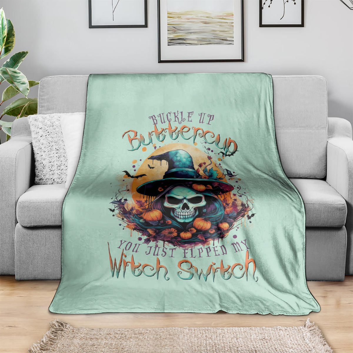 Mint green witch skull graphic throw blanket with Buckle Up and Witch Switch text