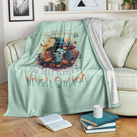 Mint green witch skull throw blanket with white backing edge