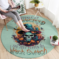 Teal round witch skull rug with black hat, orange pumpkins, and spooky spell text