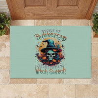 Teal rectangular rubber doormat with witch skull graphic and 'Buckle Up Buttercup' text