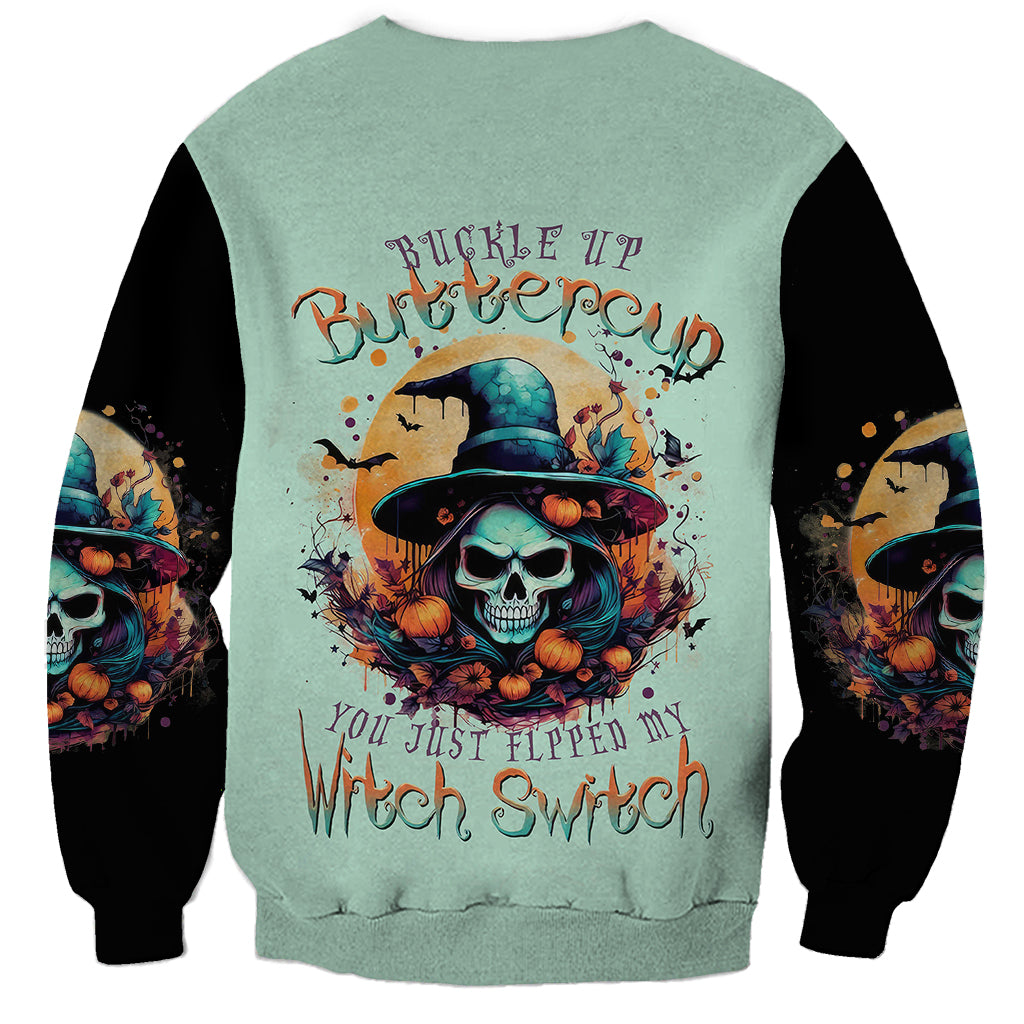Unisex mint green sweatshirt with skull witch graphic and black long sleeves