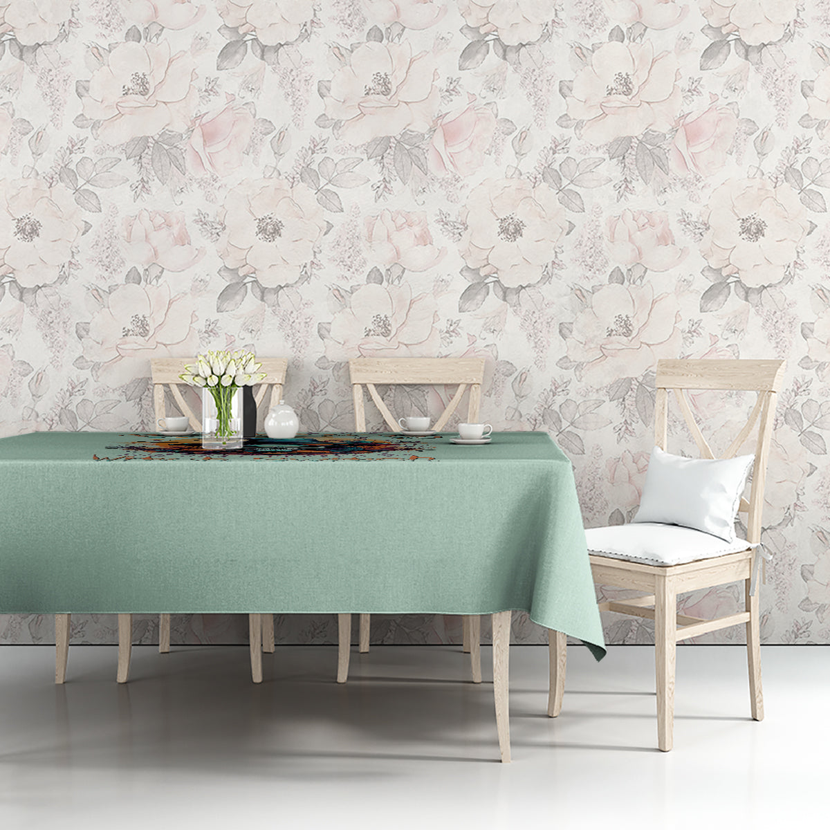 Mint green tablecloth on dining table with witch skull scene print