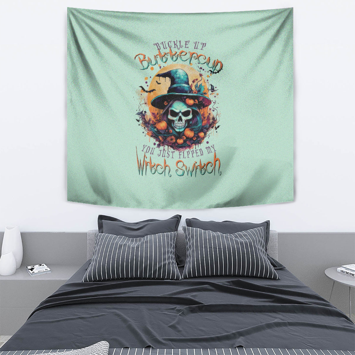 Light teal witch skull tapestry with colorful hat graphic and text, wall-hanging