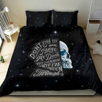 Black galaxy bedding set with skull face print and typography on duvet, two pillows