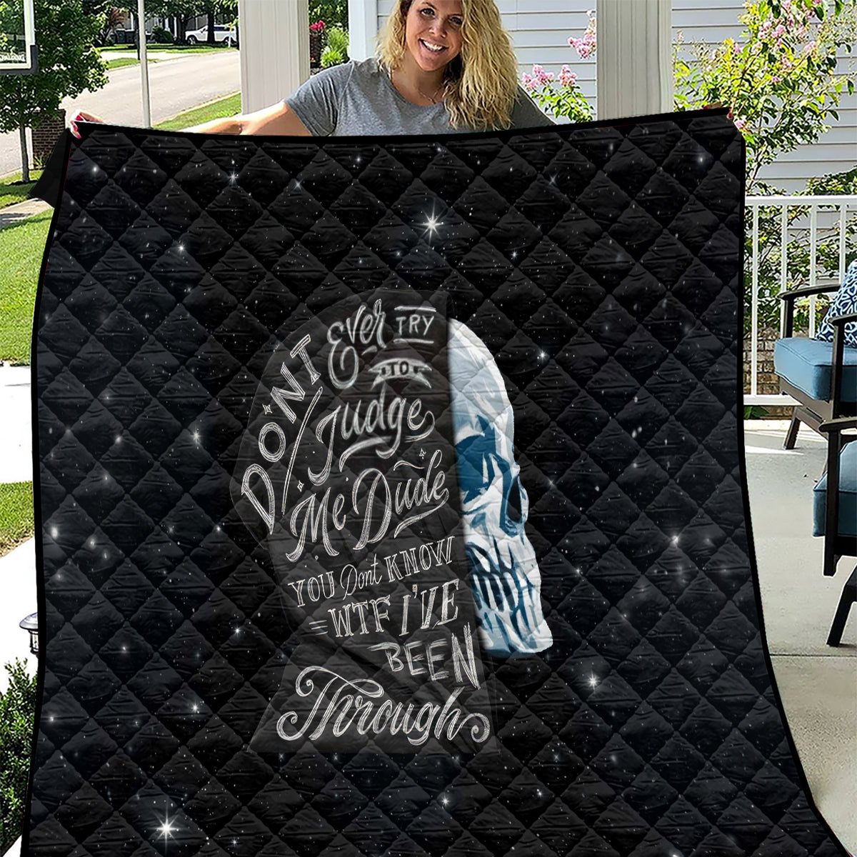 Black quilt panel with skull graphic and 'Judge' quote, diamond quilted texture