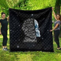 Black quilt with diamond stitching and a skull graphic with 'Judge' text