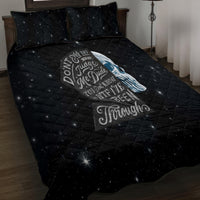 Black quilt bed set showing blue skull print on quilt with two matching pillowcases