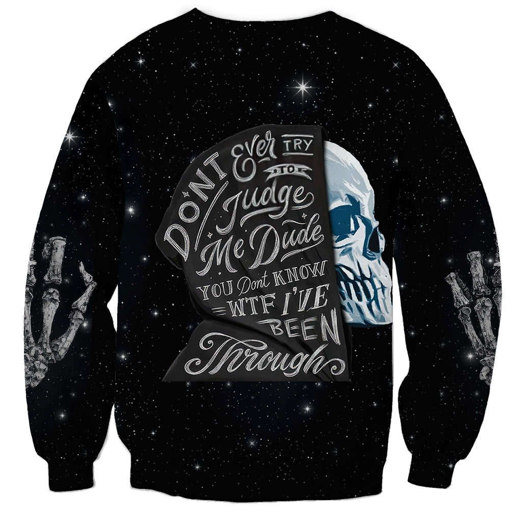 Black crewneck sweatshirt with large front skull and star text graphic