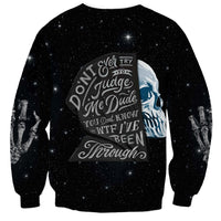 Black crewneck sweatshirt with large front skull and star text graphic