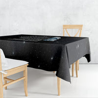 Black skull tablecloth with blue-gray skull graphic and starry speckled pattern