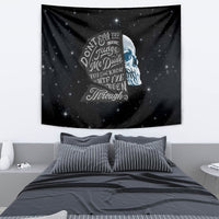 Black starry tapestry featuring a blue skull profile and layered vintage-style text