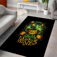 Black Halloween area rug with green pumpkin skull cauldron art and 'Drink Witches' text