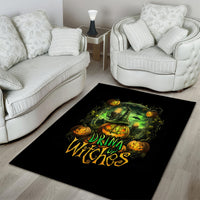 Black Halloween area rug with green cauldron and pumpkins, 'Drink Witches' lettering