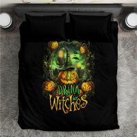Black bedding set with “Drink Witches” pumpkin skull design and two matching pillowcases