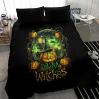 Black duvet and pillowcases featuring green glow pumpkin skull “Drink Witches” artwork
