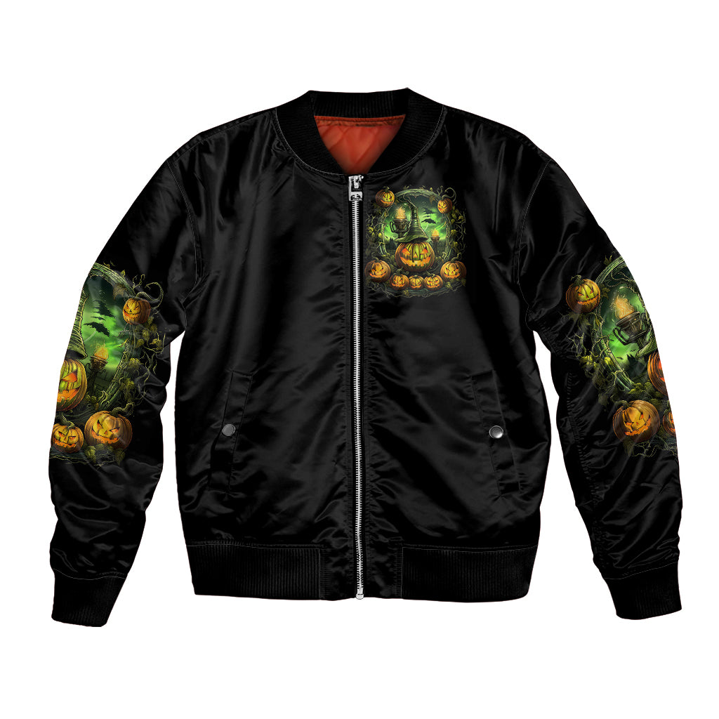 Black bomber jacket with front zipper, orange lining, pumpkin witch graphic (front)