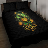 Black quilted comforter with green pumpkin skull Drink Witches graphic and two pillows