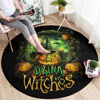 Round black witch-themed rug with green cauldron, pumpkins, and “Drink up Witches” text