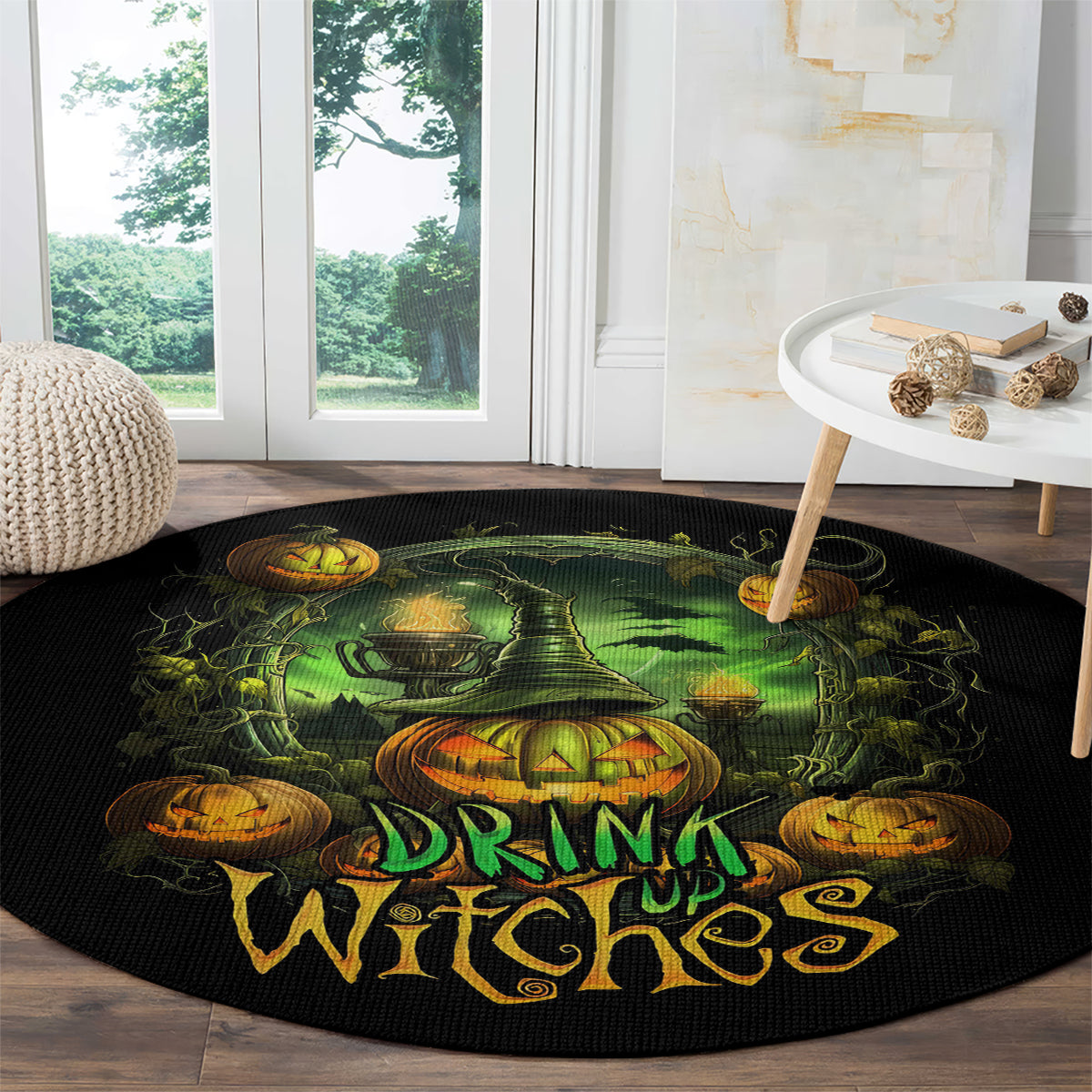 Round black witch-themed rug with green cauldron and orange pumpkins, “Drink up Witches”