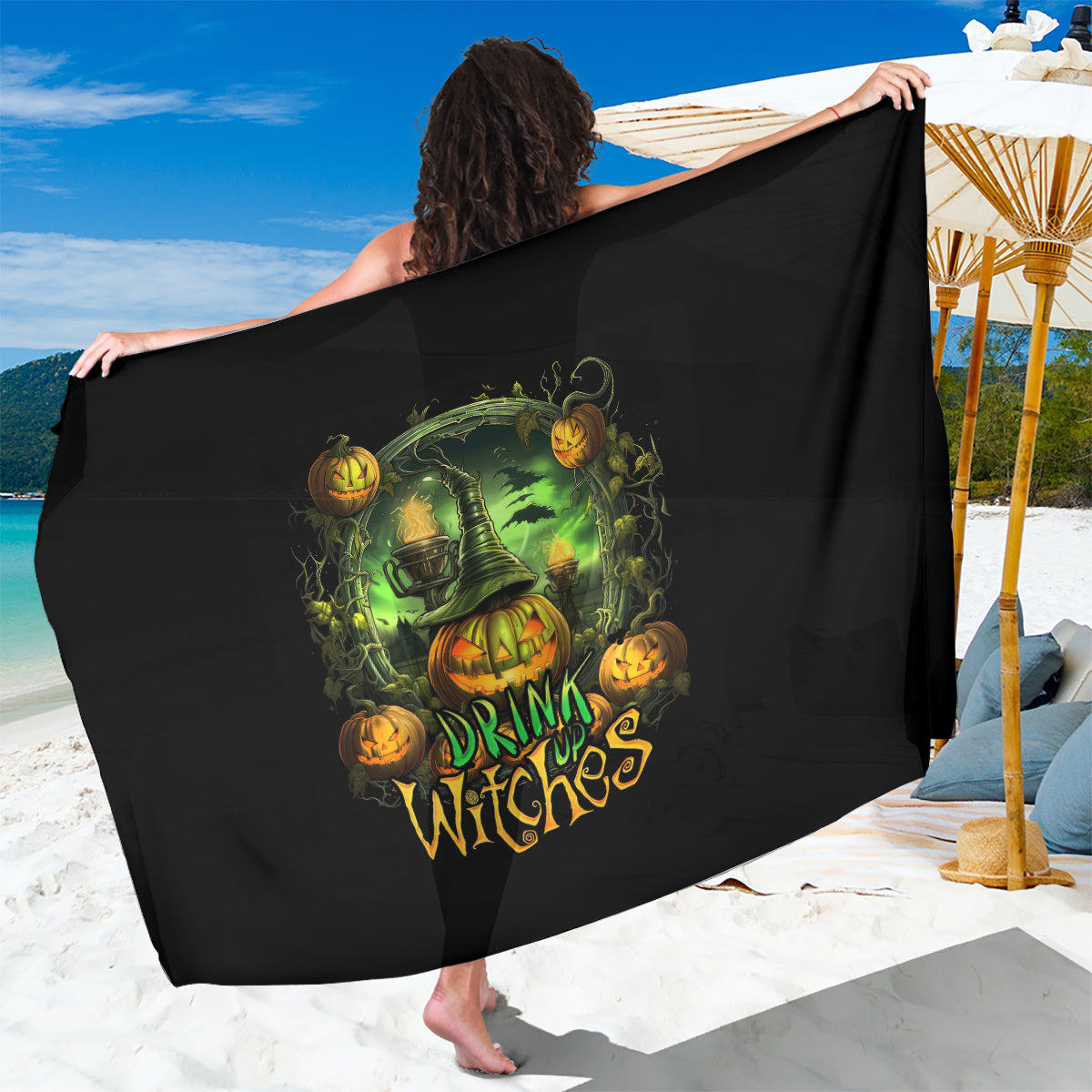 Black sarong with centered green pumpkin skull and 'Drink Up Witches' graphic