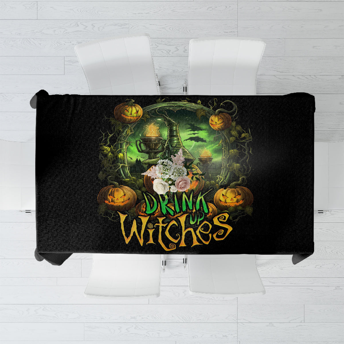Black tablecloth showing full 'Drink up Witches' pumpkin skull centerpiece graphic.