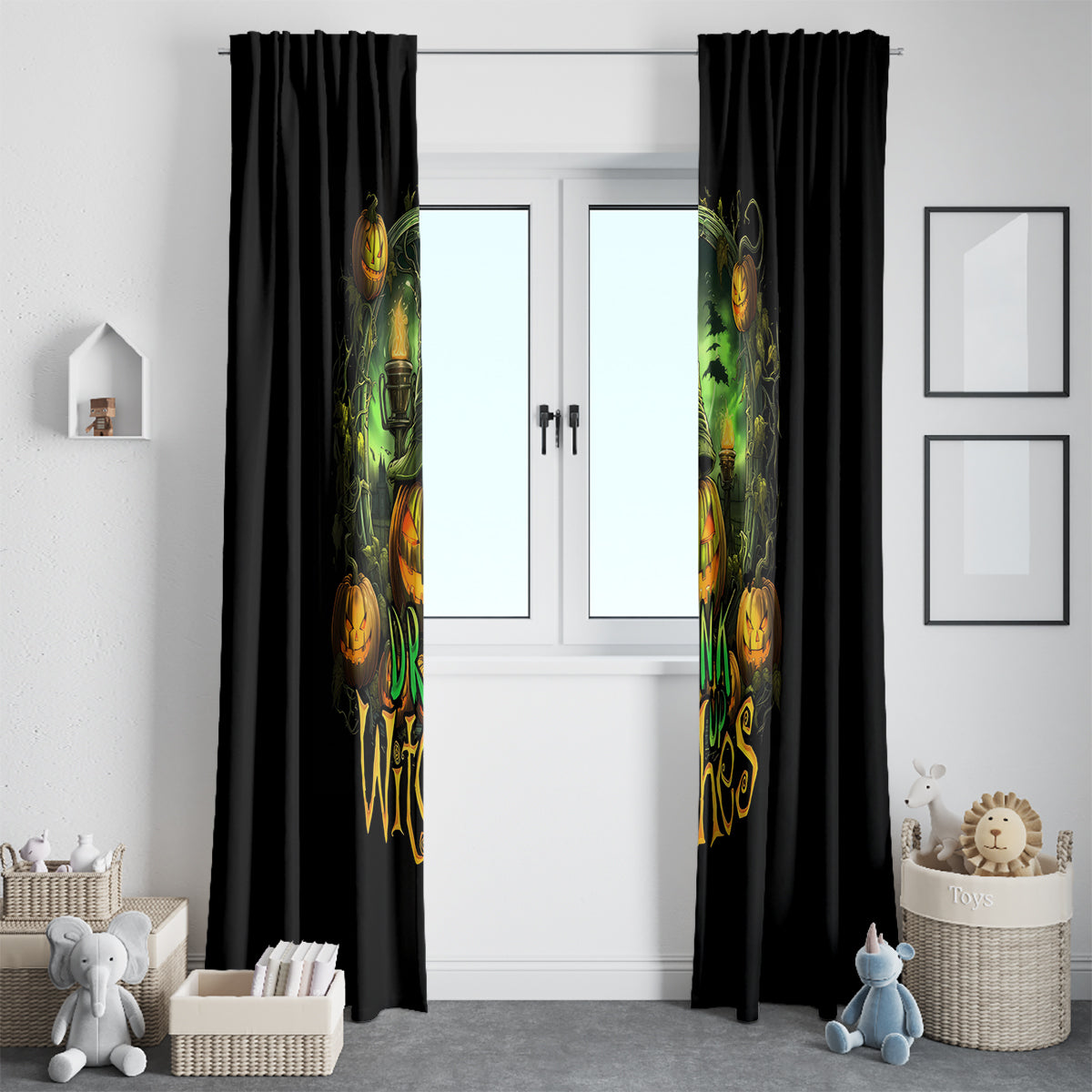 Black window curtain panels with green pumpkin-and-witch artwork hanging on a white door