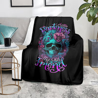 Black skull floral throw blanket on sofa, teal skull and purple 'My Old Friend' text