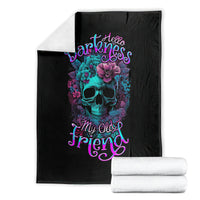 Black skull-and-flower throw blanket with folded white towels; teal skull and 'Hello Darkness' text