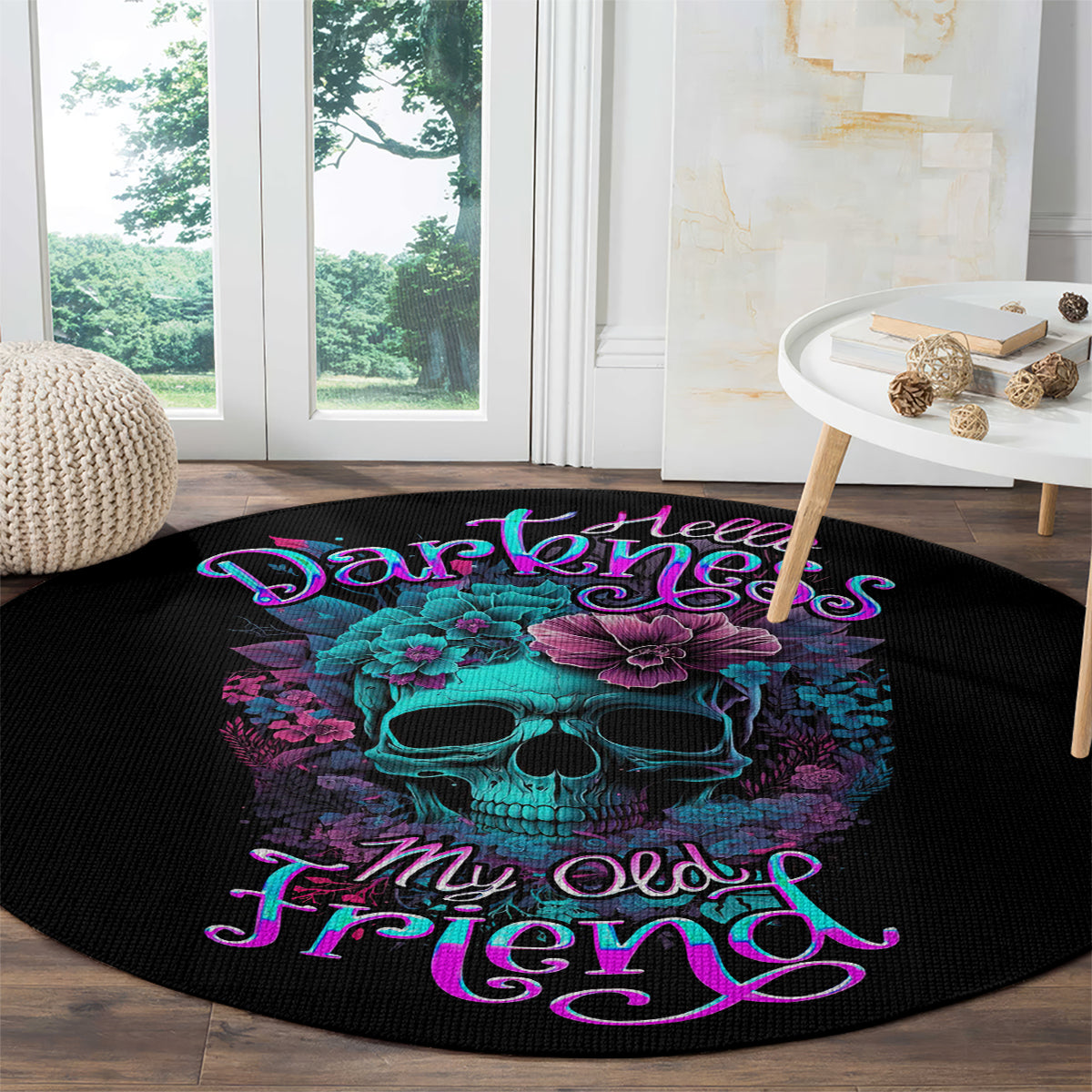 Black circular carpet rug with turquoise skull and purple floral text design on floor