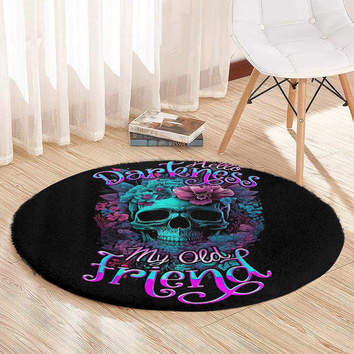 Black round rug with turquoise skull, purple flowers, and magenta-blue cursive lettering
