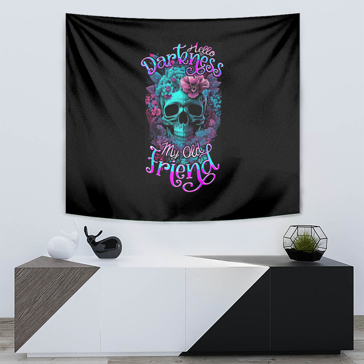Black wall tapestry showing turquoise skull with purple-blue floral accents