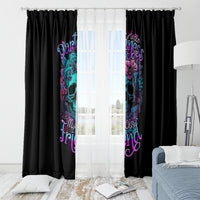 Black curtain panels with colorful skull floral print, centered on window