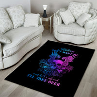 Black area rug with purple-blue skull wings and roses, blue italic message