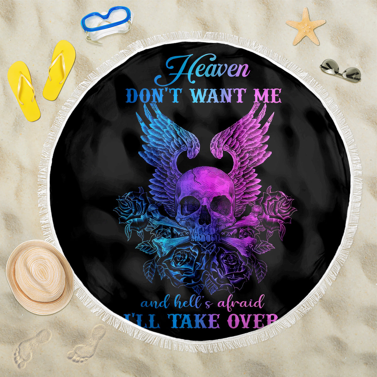 Black round beach blanket with skull-wings graphic and Heaven text, fringed edge
