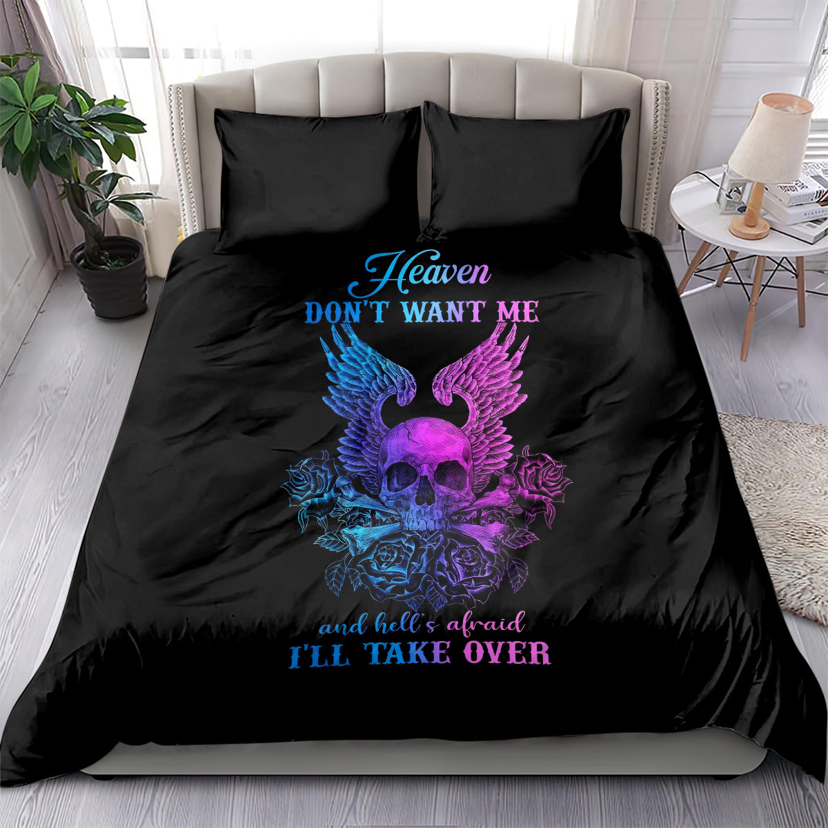 Black bedding set with skull-wing graphic, roses, and 'Heaven...' text on comforter