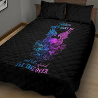 Black quilted bed set with skull-and-wings graphic, blue/purple print and coordinating pillows