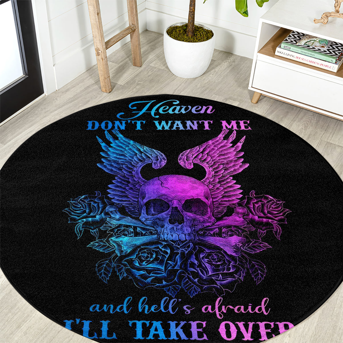 Black round rug with purple-blue winged skull and bold Heaven quote text