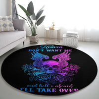 Black round rug with centered winged skull in purple and blue and Heaven text