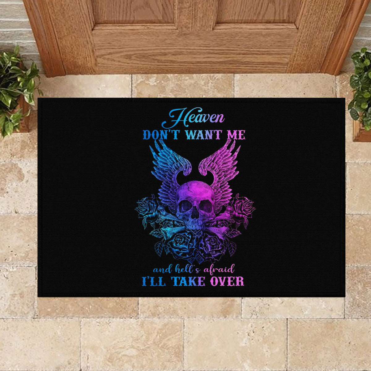 Black doormat featuring purple skull, blue wings, and 'TIL TAKE OVER' text