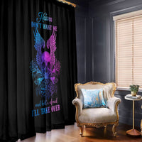 Black window curtain with vertical blue and purple winged skull design and text