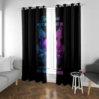 Black window curtains with blue and purple winged skull print and central text