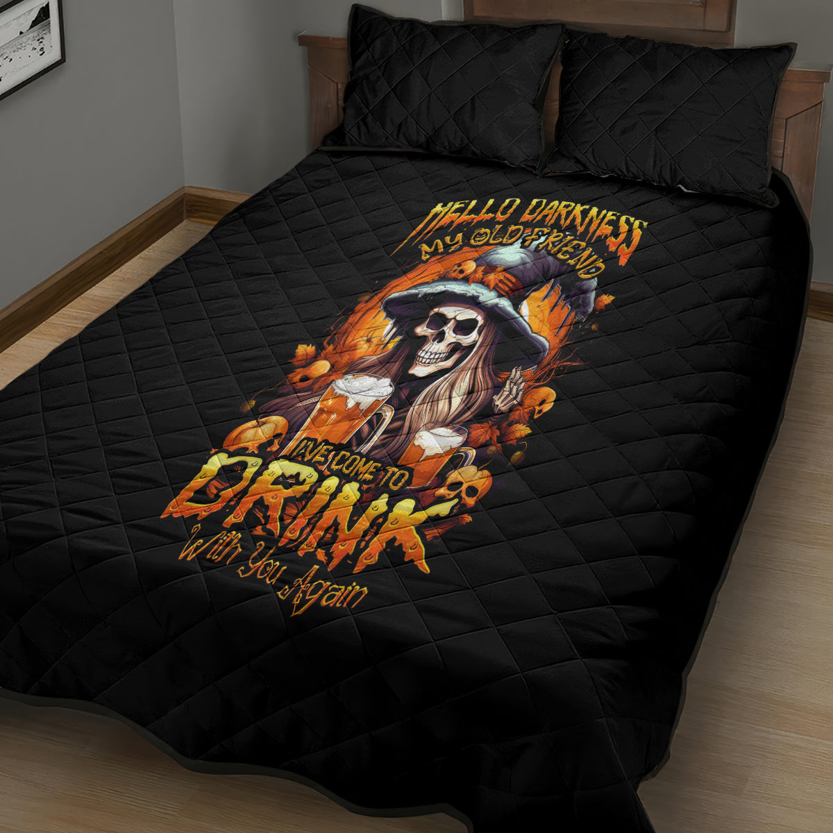 Black quilted bed set with witch skull graphic and two matching pillows