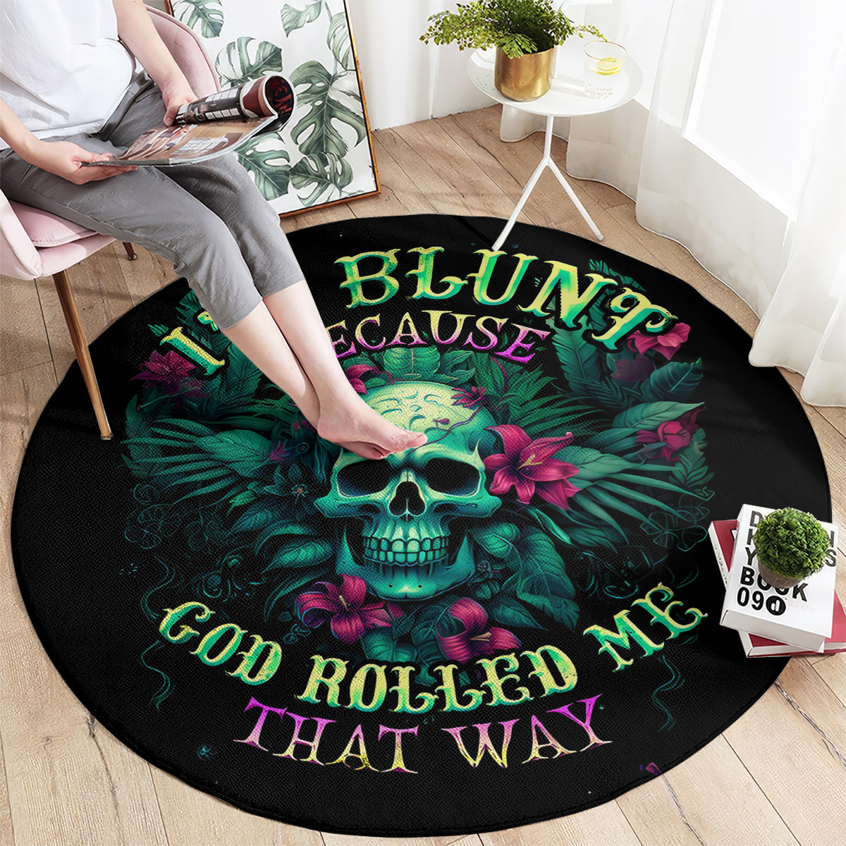 Black round skull area rug with neon tropical flowers, skull center, 'GOD ROLLED ME' text