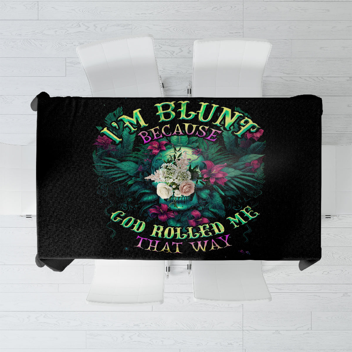 Black tablecloth featuring colorful skull graphic and stacked slogan text