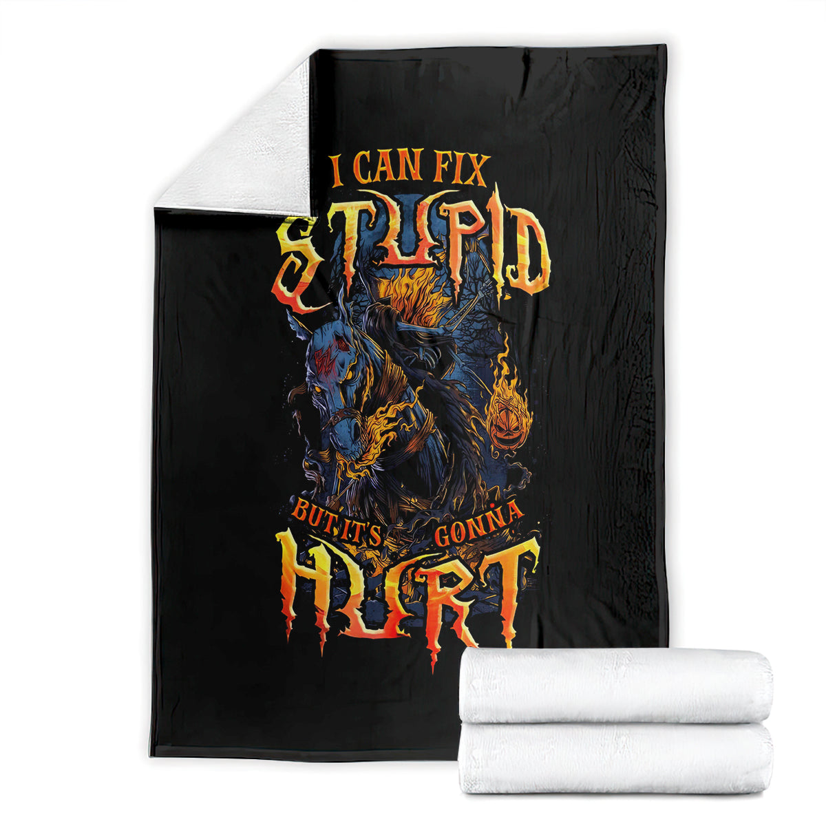 Black blanket with flaming skull graphic and distressed quote text, folded with white rolls