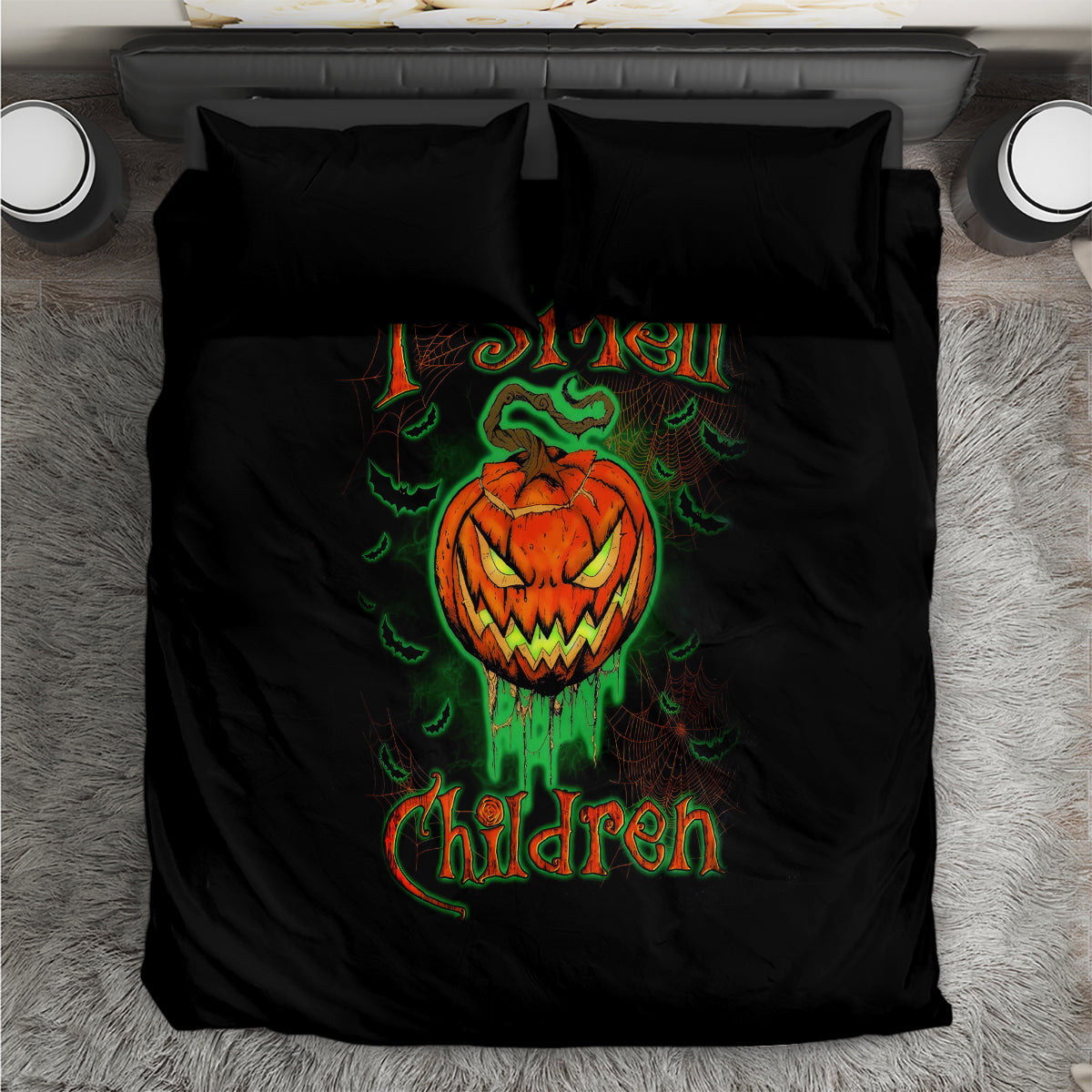 Black duvet and pillow set featuring jack-o-lantern skull graphic with green and orange text