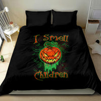 Black bedding set with jack-o-lantern skull artwork and green glowing text centered on duvet